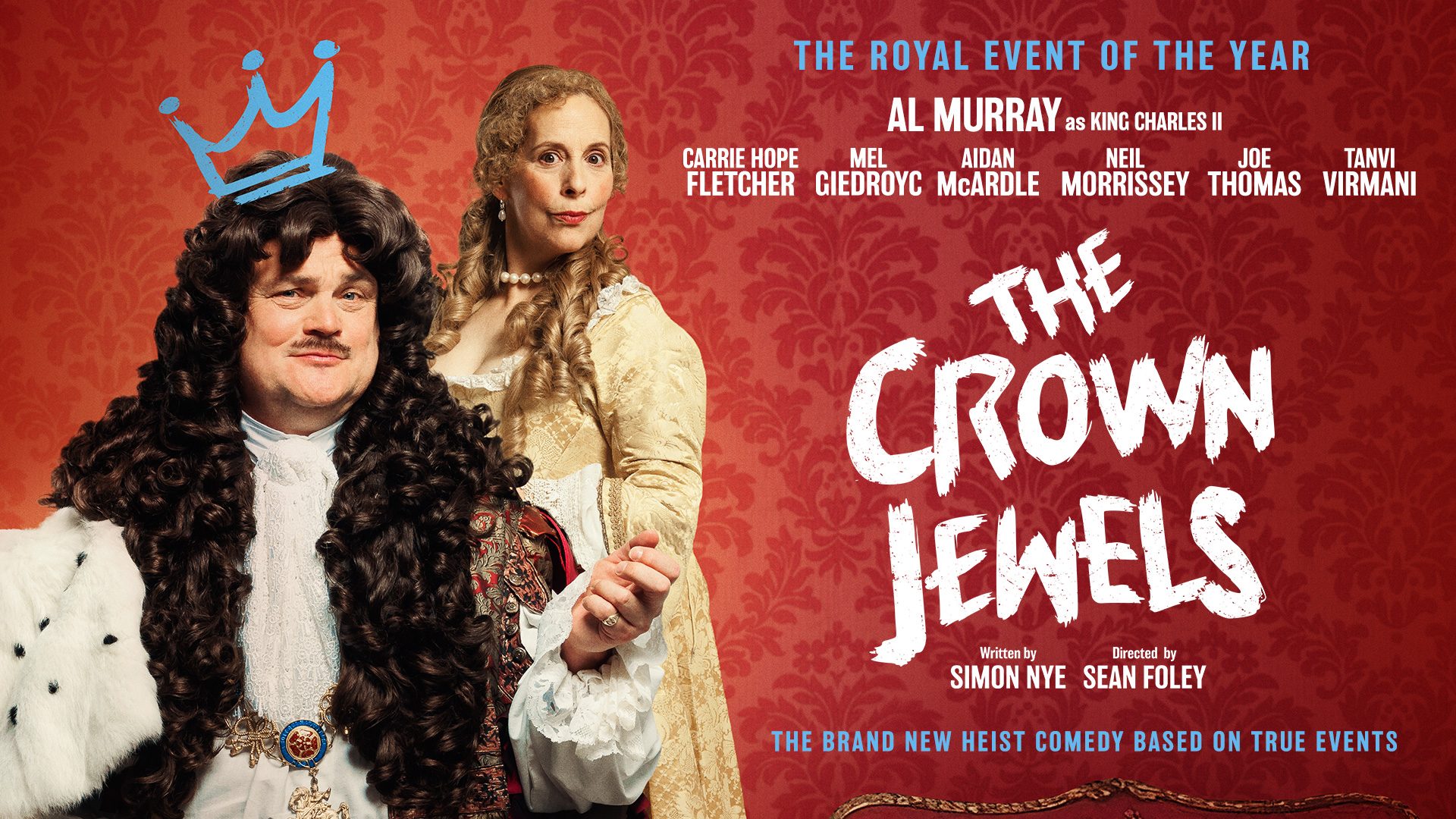 The Crown Jewels displayed in a glass case, featuring ornate crowns and regal accessories.