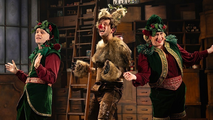 Matt Crockett performing in a scene from A Christmas Carol (ish), dressed in period costume.