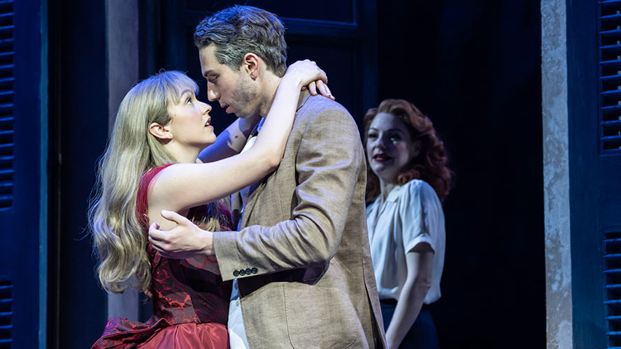 A scene from Aspects of Love at the Lyric Theatre, featuring actors on stage in costume.