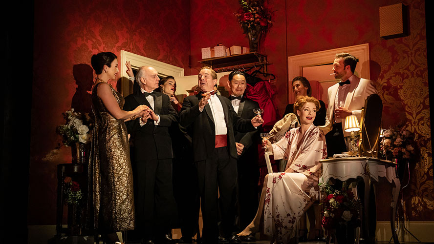 A scene from Aspects of Love at the Lyric Theatre, featuring actors on stage in costume.