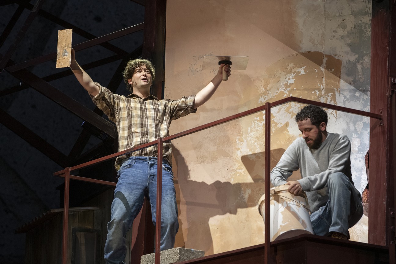 Four actors in rehearsal, dressed in period clothing, on stage at the Royal Court Theatre, Liverpool.