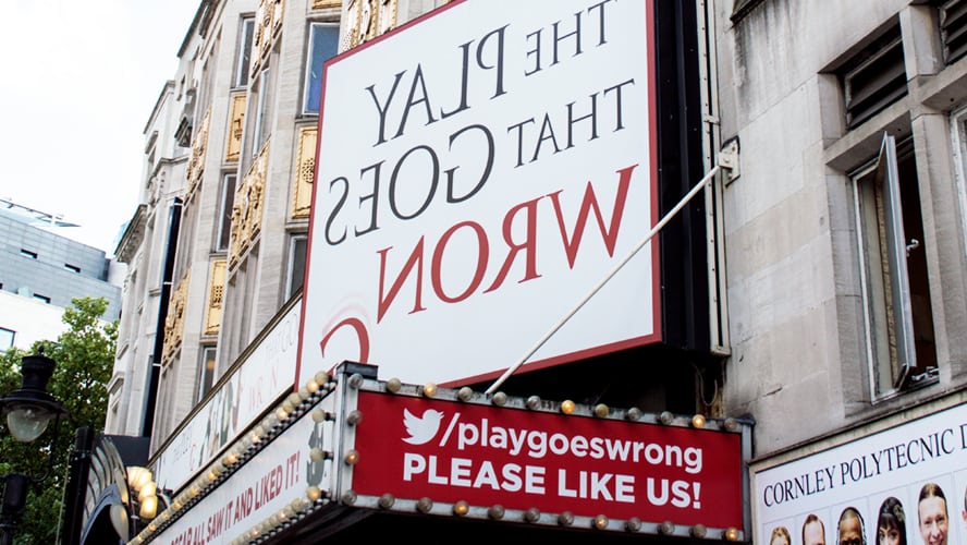 Duchess Theatre exterior featuring a classic façade and illuminated marquee at night.