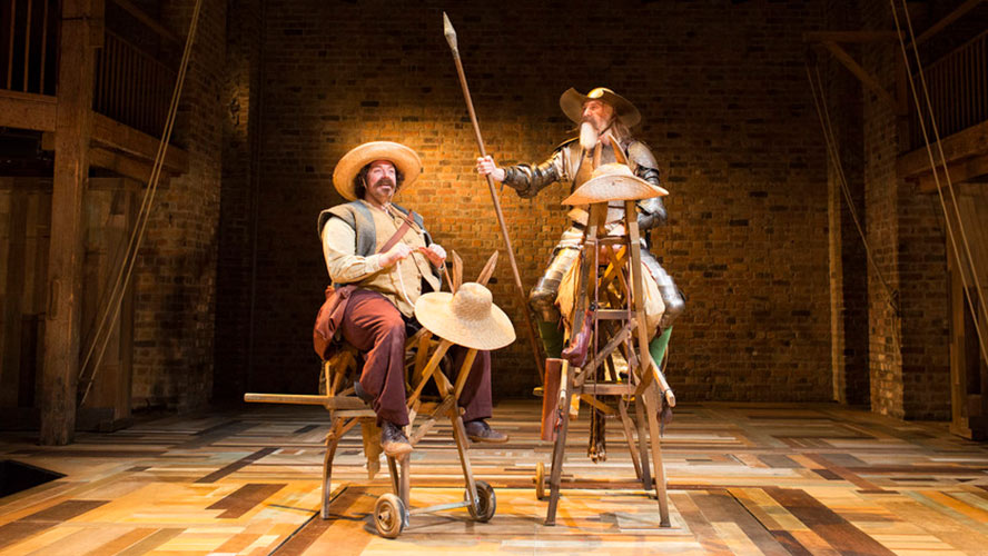 A scene from Don Quixote featuring a knight in armour on horseback, surrounded by dramatic scenery.
