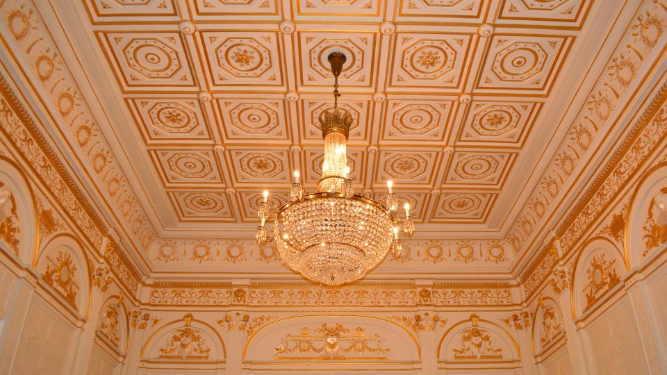 Intricate decorative plaster ceiling above the upper level of the Gold Bar and Terrace at Garrick Theatre.