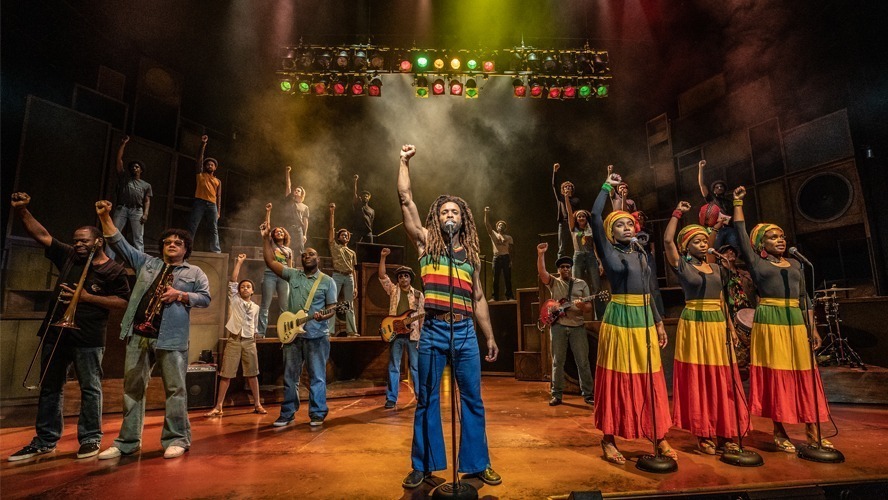 A vibrant stage scene from "Get Up, Stand Up" at the Lyric Theatre, March 2022.