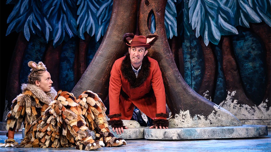 Harriet Waters and Maxwell Tyler pose together, smiling, in a colourful Gruffalo's Child setting.