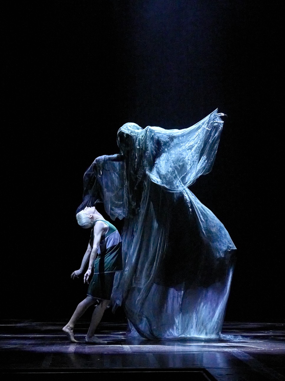 A scene from Harry Potter and the Cursed Child, featuring actors in wizarding costumes on stage.