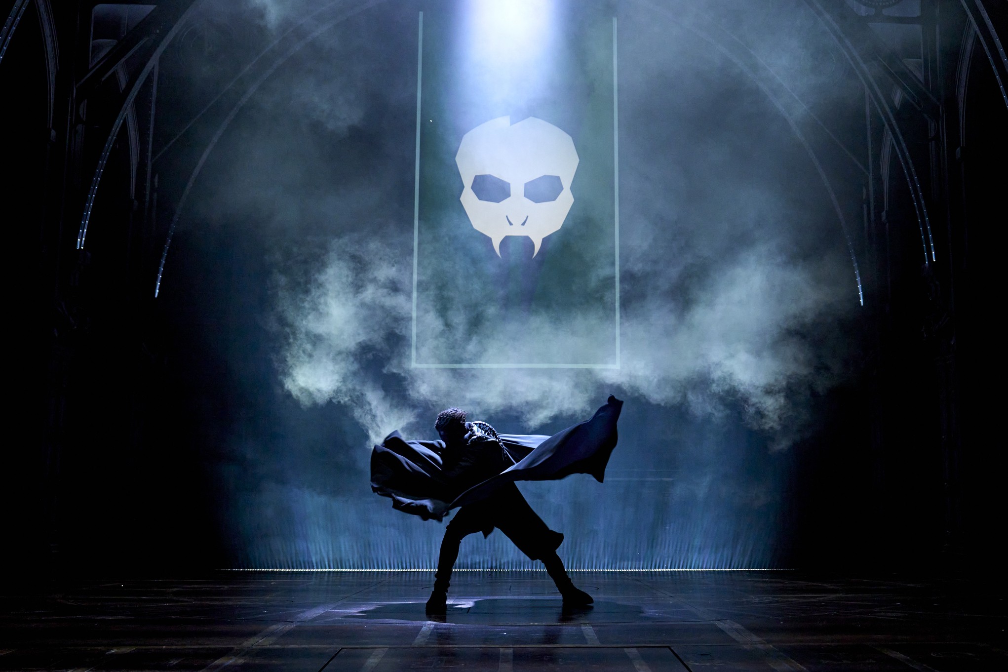 A scene from Harry Potter and the Cursed Child, featuring actors in costume on stage.