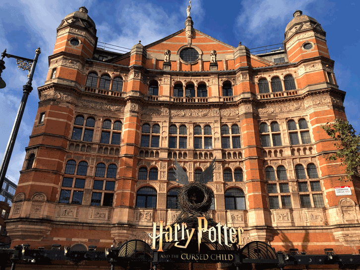 HPCC logo displayed prominently at the Palace Theatre entrance, featuring bold lettering and vibrant colours.