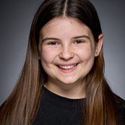 Layla Duke as a character in Harry Potter and the Cursed Child, wearing a wizarding costume.