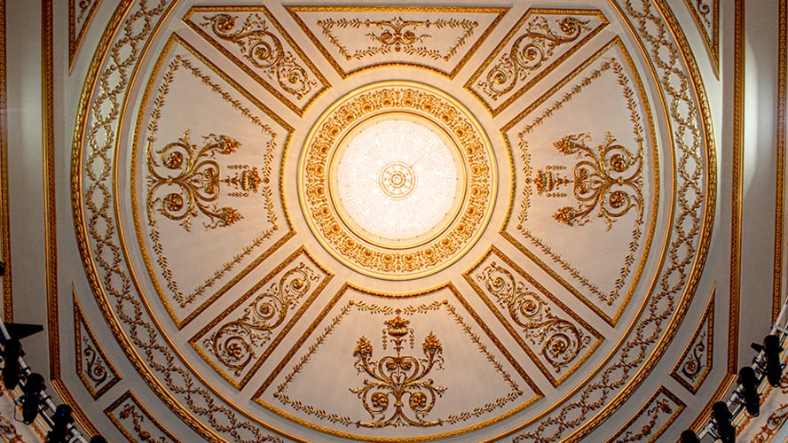 Interior view of the Lyric Theatre, showcasing ornate architecture and elegant seating arrangements.