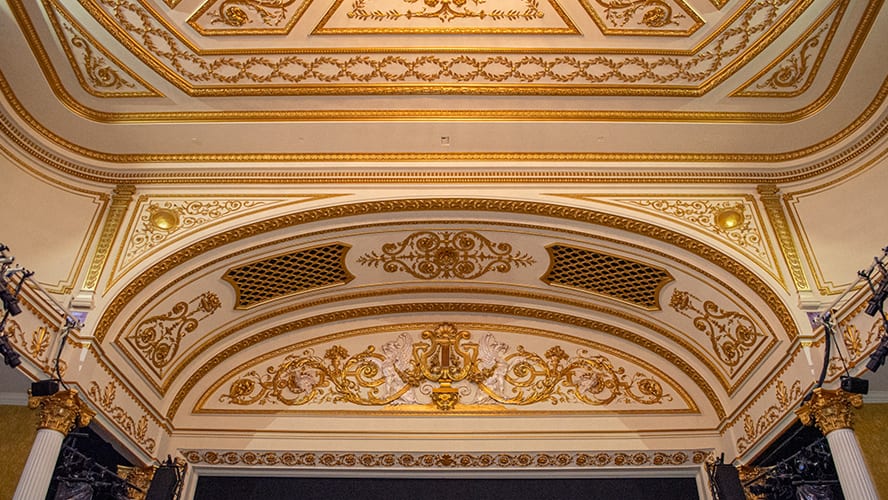 Elegant interior of Lyric Theatre featuring plush seating and ornate architectural details.