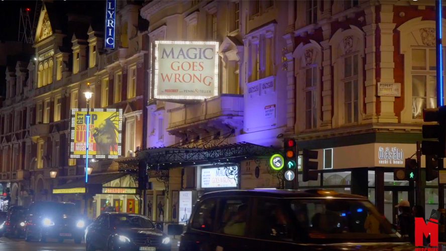 A vibrant video display featuring magical effects and swirling colours against a dark background.