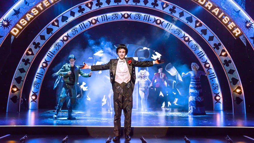 A stage at the Vaudeville Theatre, featuring dramatic lighting and elaborate set design for a performance.