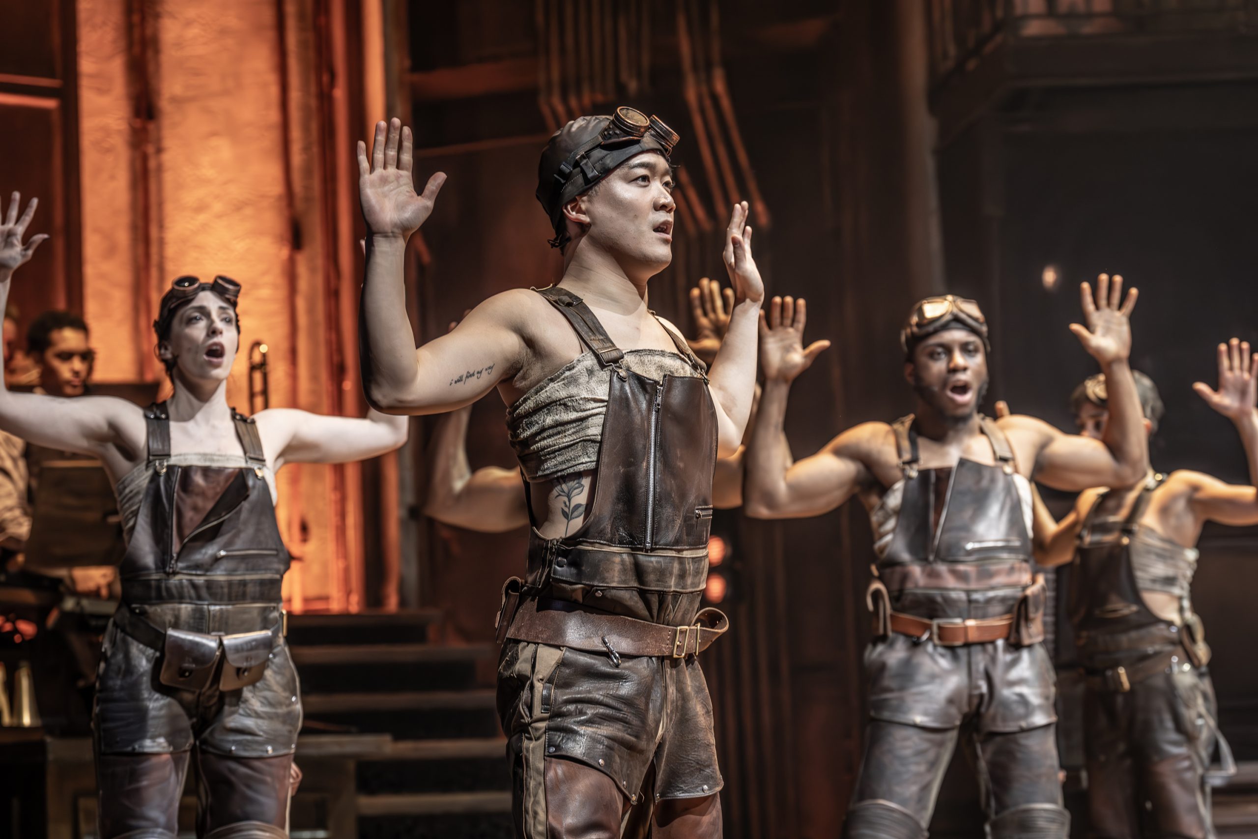 Michelle Andrews, Sebastian Lim-Seet, and Femi Akinfolarin in Hadestown
