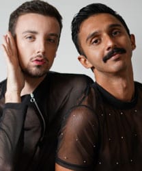 Mufseen Miah and Spencer Cooper standing together, smiling, against a neutral background.