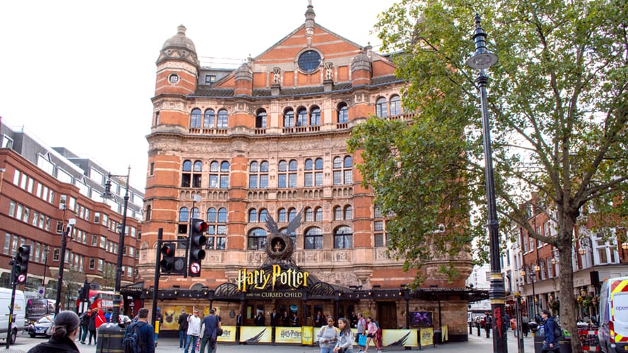 Exterior of the Palace Theatre, featuring the marquee for "Harry Potter and the Cursed Child.