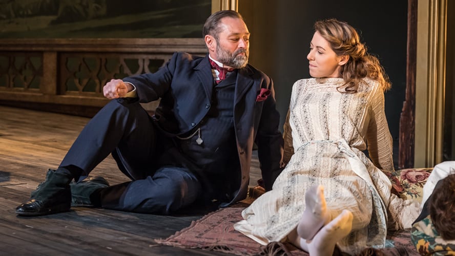 Paul Rider as Mr Kelvil and Phoebe Fildes as Lady Stutfield in theatrical costumes.