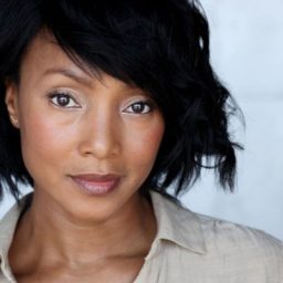 Paulette P Williams, a Black woman with short hair, smiling against a neutral background.
