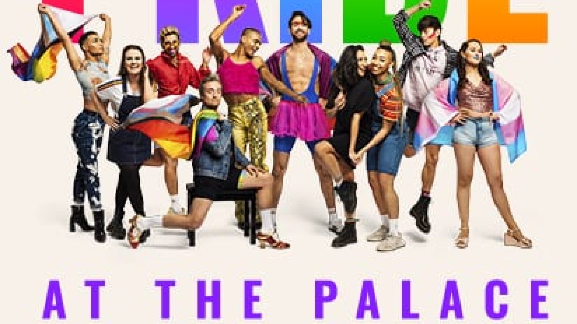 Colourful Pride flag displayed prominently in a vibrant outdoor setting at the Palace.