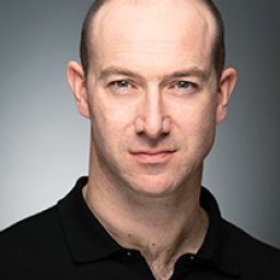 Robert Curtis in costume, portraying a character from Harry Potter and the Cursed Child on stage.