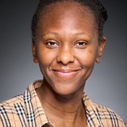 Sabina Cameron portraying a character in Harry Potter and the Cursed Child, wearing a costume on stage.