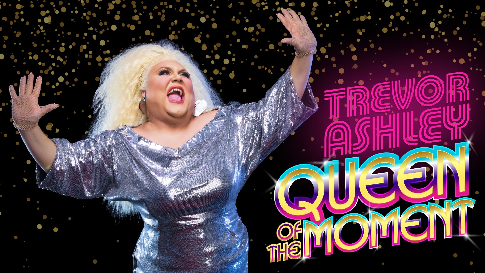 Trevor Ashley performing on stage, dressed in a glamorous costume with dramatic lighting.