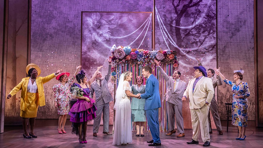 The cast of The Time Traveller's Wife poses together on stage at the Apollo Theatre.