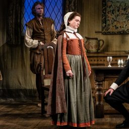 Cast members of The Upstart Crow pose together on stage at the Apollo Theatre.