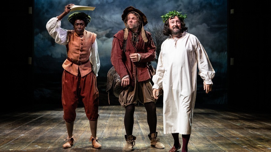 Cast members of The Upstart Crow pose together on stage at the Apollo Theatre.