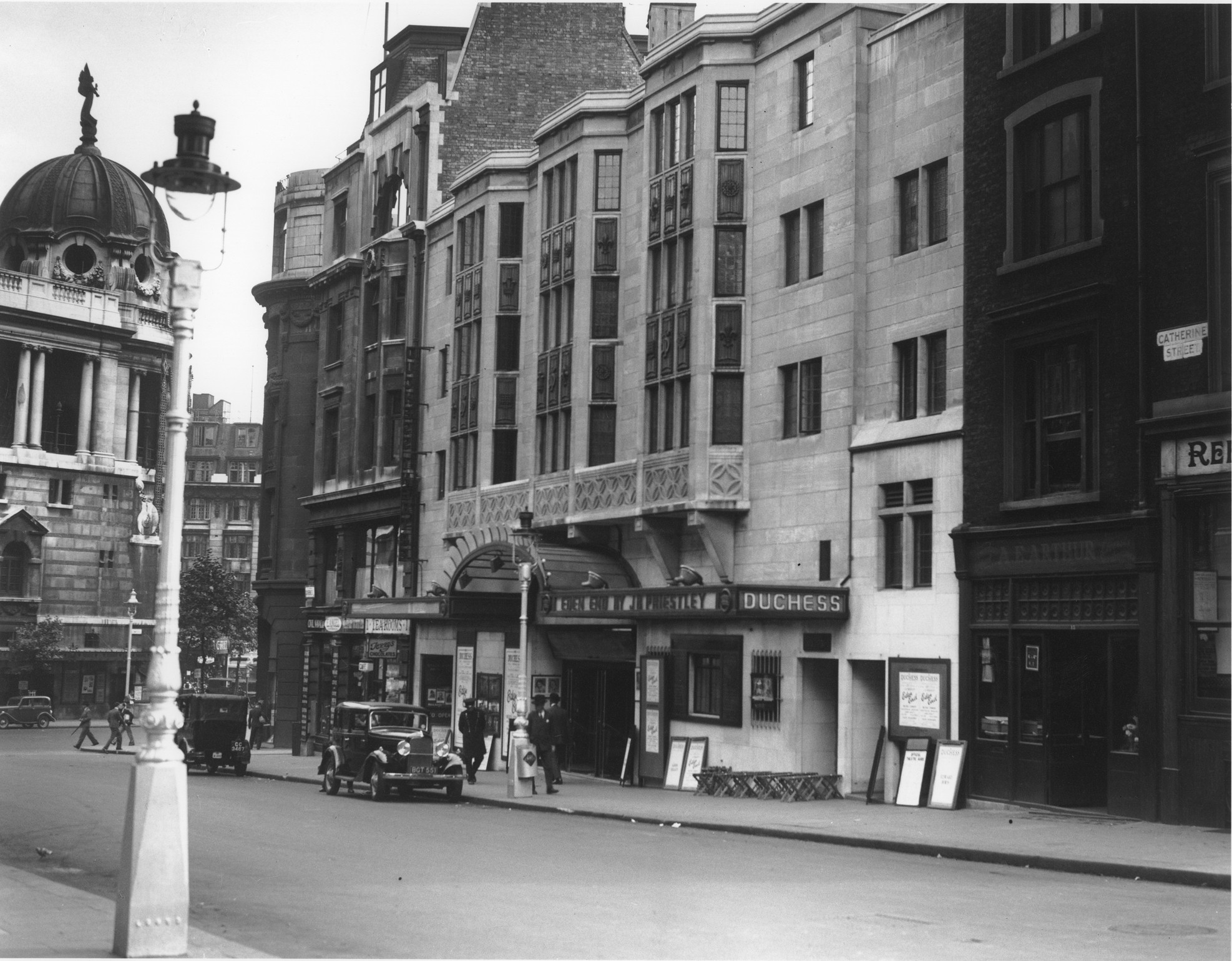 Duchess Theatre exterior featuring a classic marquee and ornate architectural details in London.