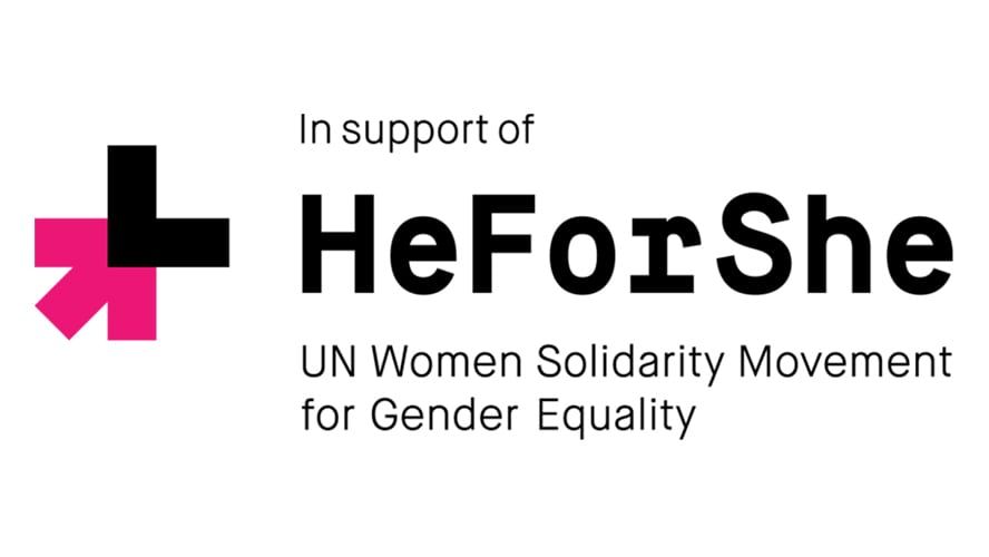 A diverse group of people holding hands, united in support of the HeForShe campaign.