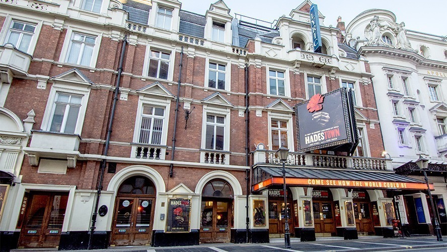 Exterior view of the Lyric Theatre, featuring ornate architecture and a prominent marquee.
