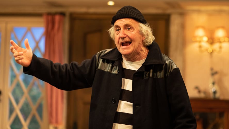 A stage scene from "Noises Off" at Lyric Hammersmith Theatre, featuring actors in a comedic moment.