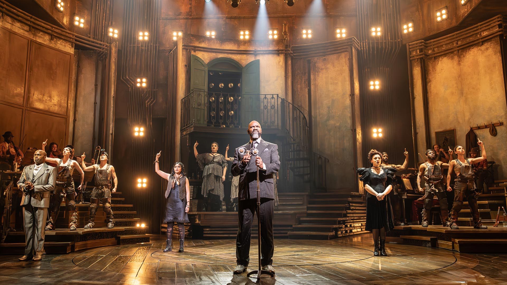 Hadestown Promotional artwork for Hadestown featuring stylised characters and vibrant colours against a dark background.