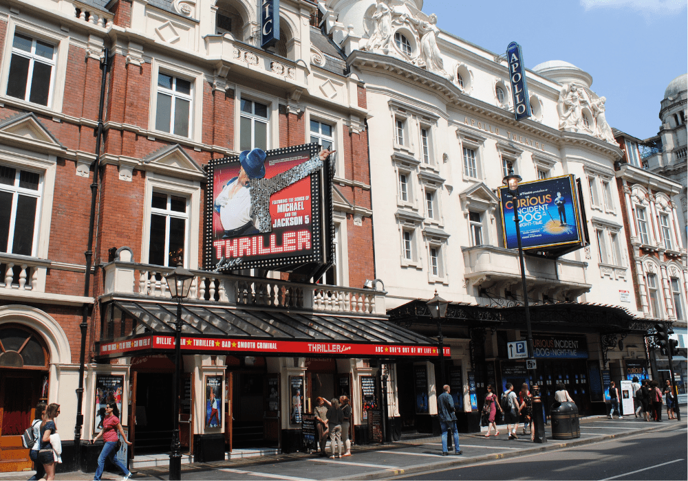 Lyric Apollo Theatre exterior with a marquee, showcasing vibrant lights and classic architectural details.