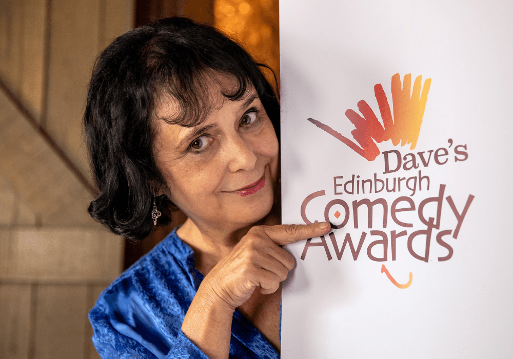 Nica Comedy Awards logo featuring bold text and a stylised microphone on a vibrant background.