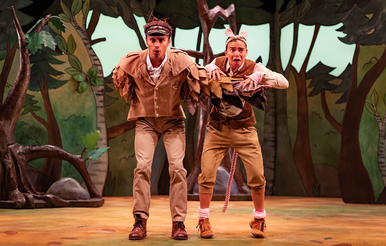 Two actors in brown costumes perform on stage with forest-themed backdrop during The Gruffalo play.
